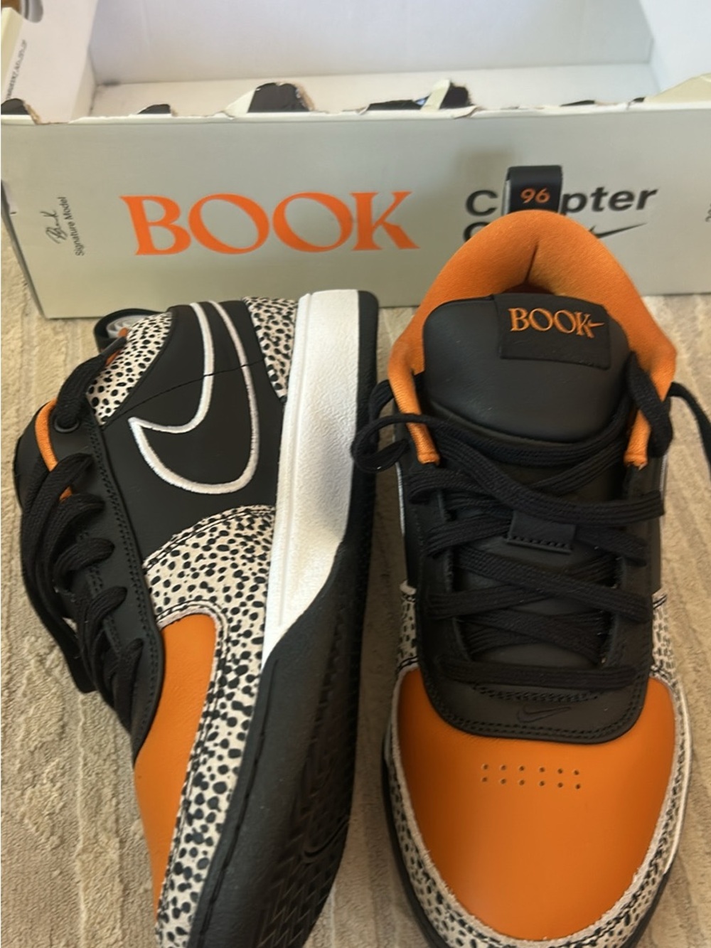Nike Book Men’s Low-Top Sneakers in Black, Orange, and White Speckle